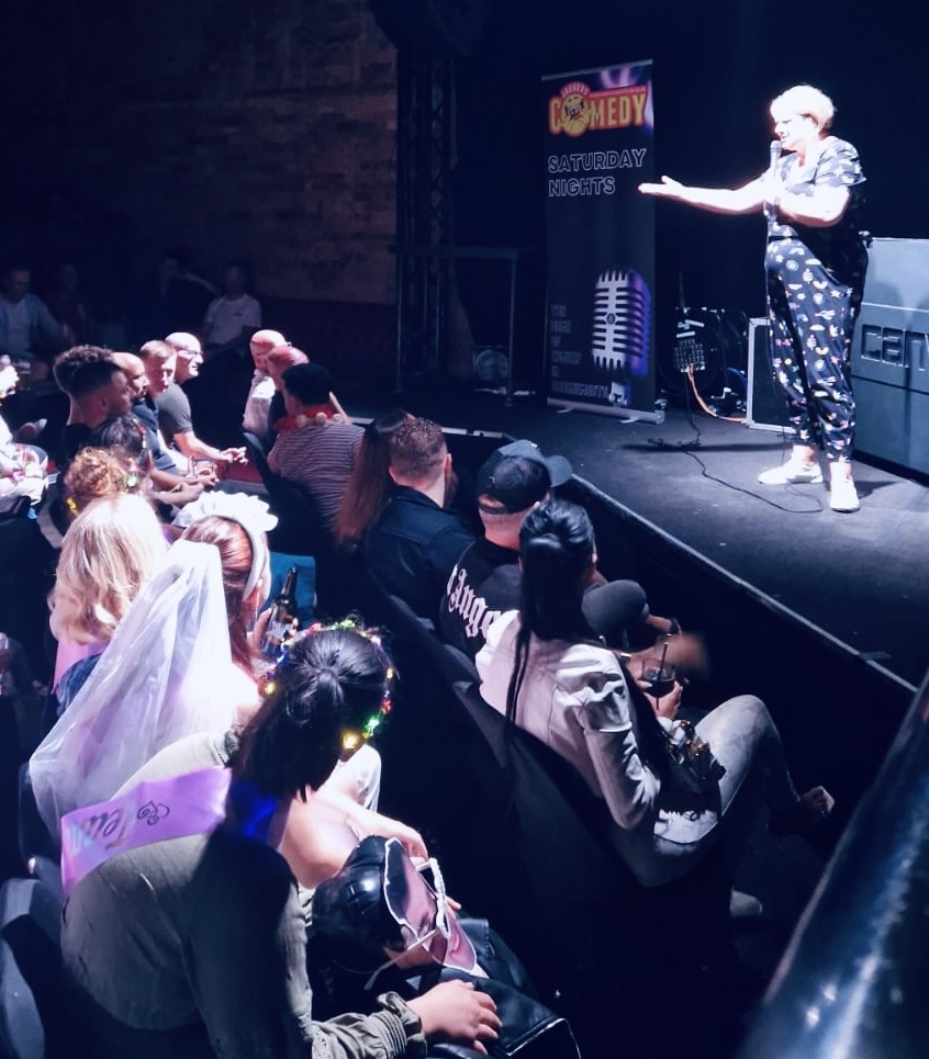 Energetic comedy performance with hen party guests enjoying Saturday night show at Jaggers